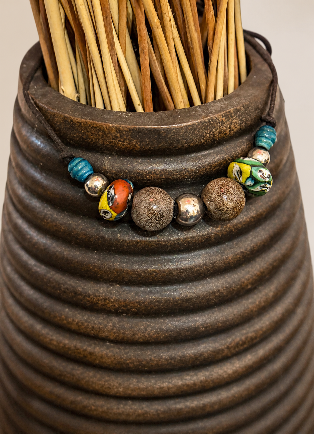 African-inspired handmade bead necklace strung on a simple tie-on rope
